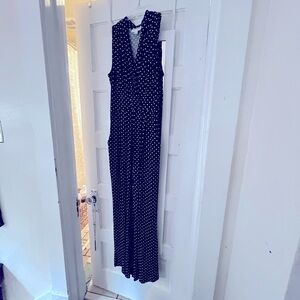 Super cute black and white polka dot jumpsuit. Size 10.